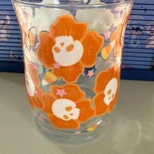 Skull and Flower Glass candle holder 2 of them
9 oz each